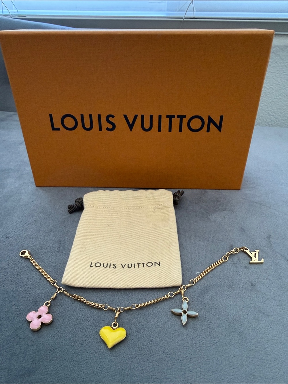 LOUIS VUITTON Multicolor Charm Bracelet – LV Monogram Flower & Heart Charms